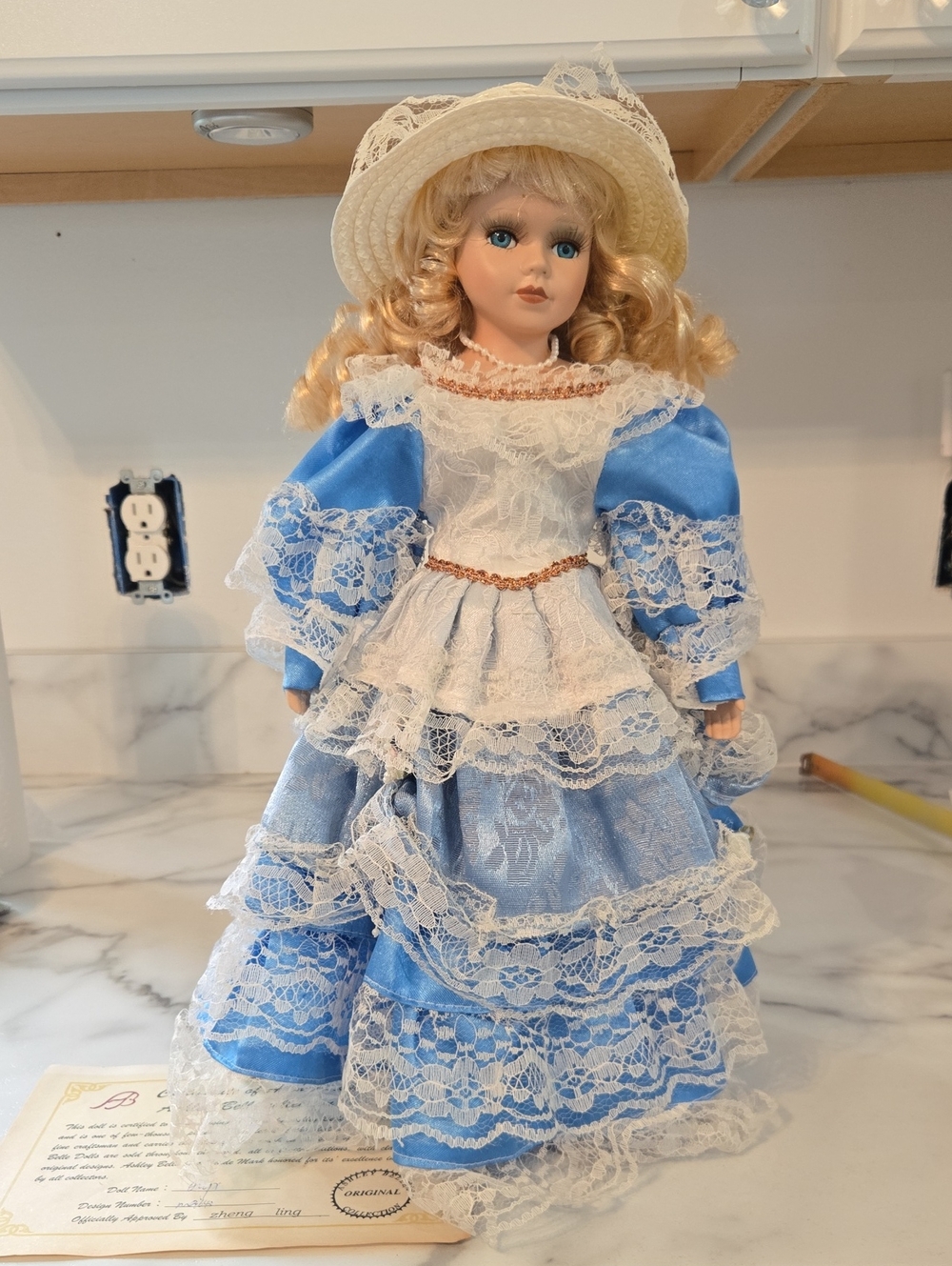 vintage Victorian-style porcelain doll from the Ashley Belle collection